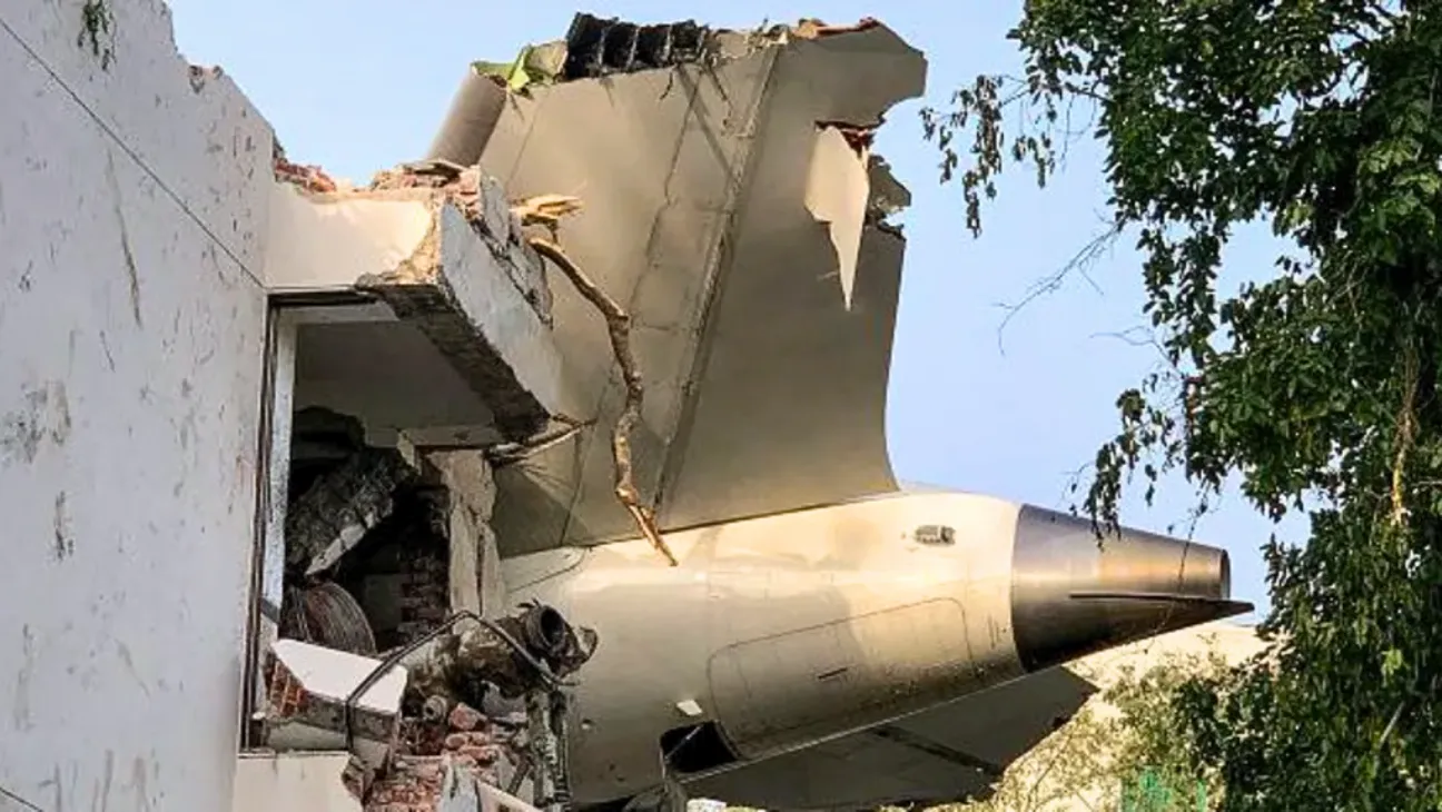 The back of Air India flight 171 is pictured at the site after it crashed in a residential area near the airport in Ahmedabad