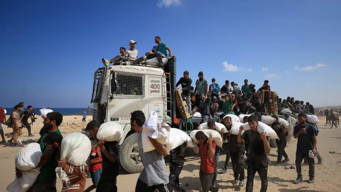 Dozens Killed in Gaza as Aid Convoys Come Under Fire Amid Worsening Hunger Crisis